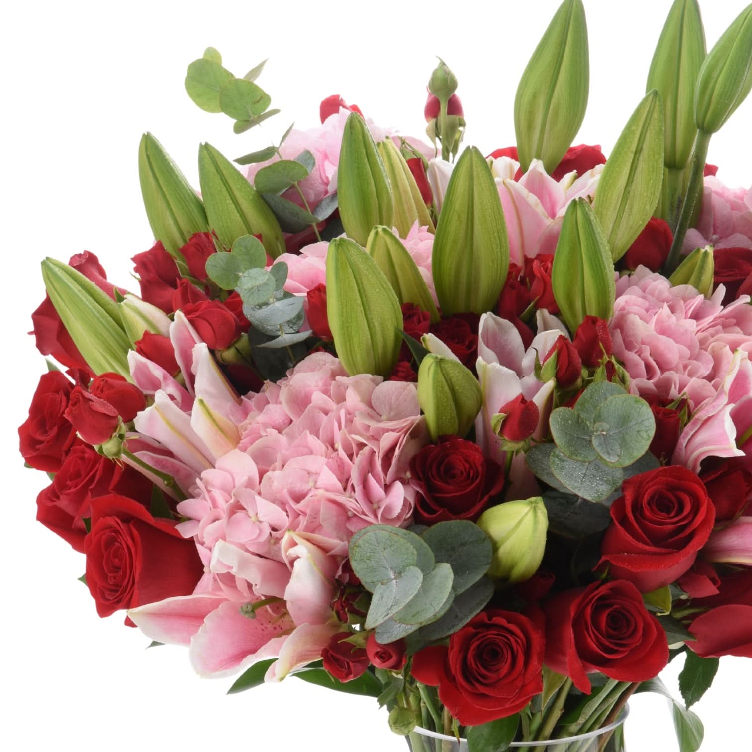 Vibrant red roses, pink hydrangeas, and green lily buds in lush floral arrangement.