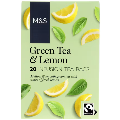 Light green pack with lemon slices and leaves, Fairtrade certified green tea & lemon bags.