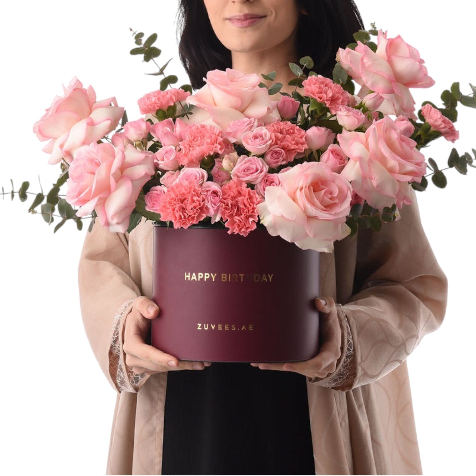 Elegant burgundy box holds lush pink roses and carnations for birthday celebration.