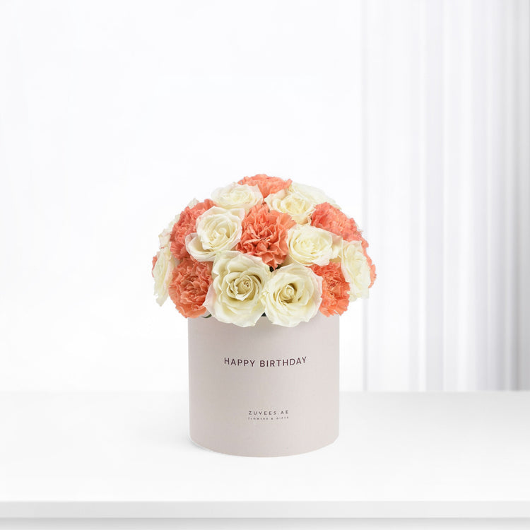 Coral and cream roses & carnations in minimalist "Happy Birthday" box.