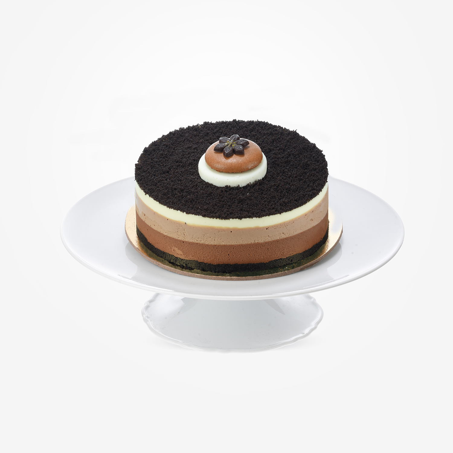 Layered chocolate cake with cookie crust, topped with delicate chocolate flower.