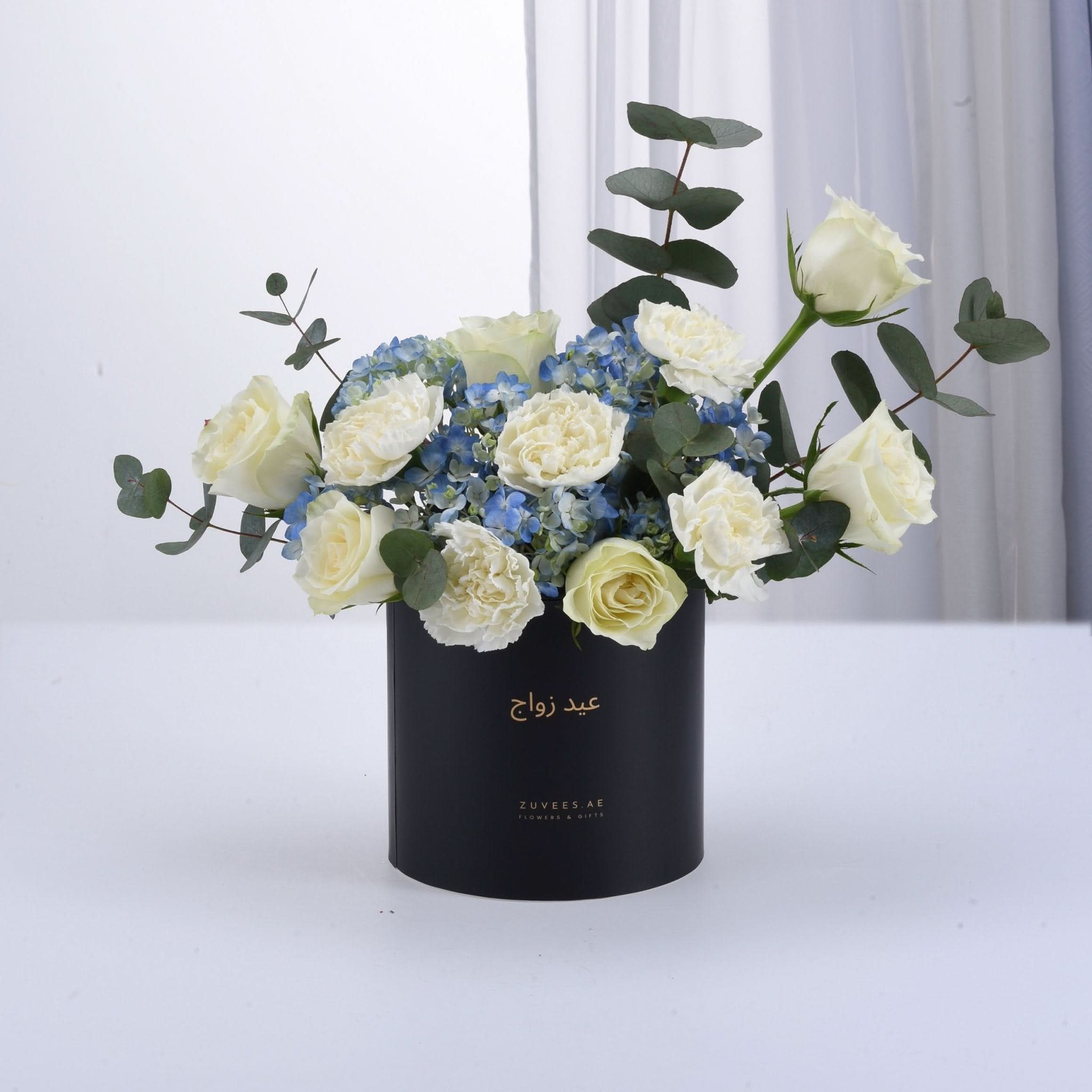 Serene Blue & White Anniversary Bloom Box - Zuvees.ae