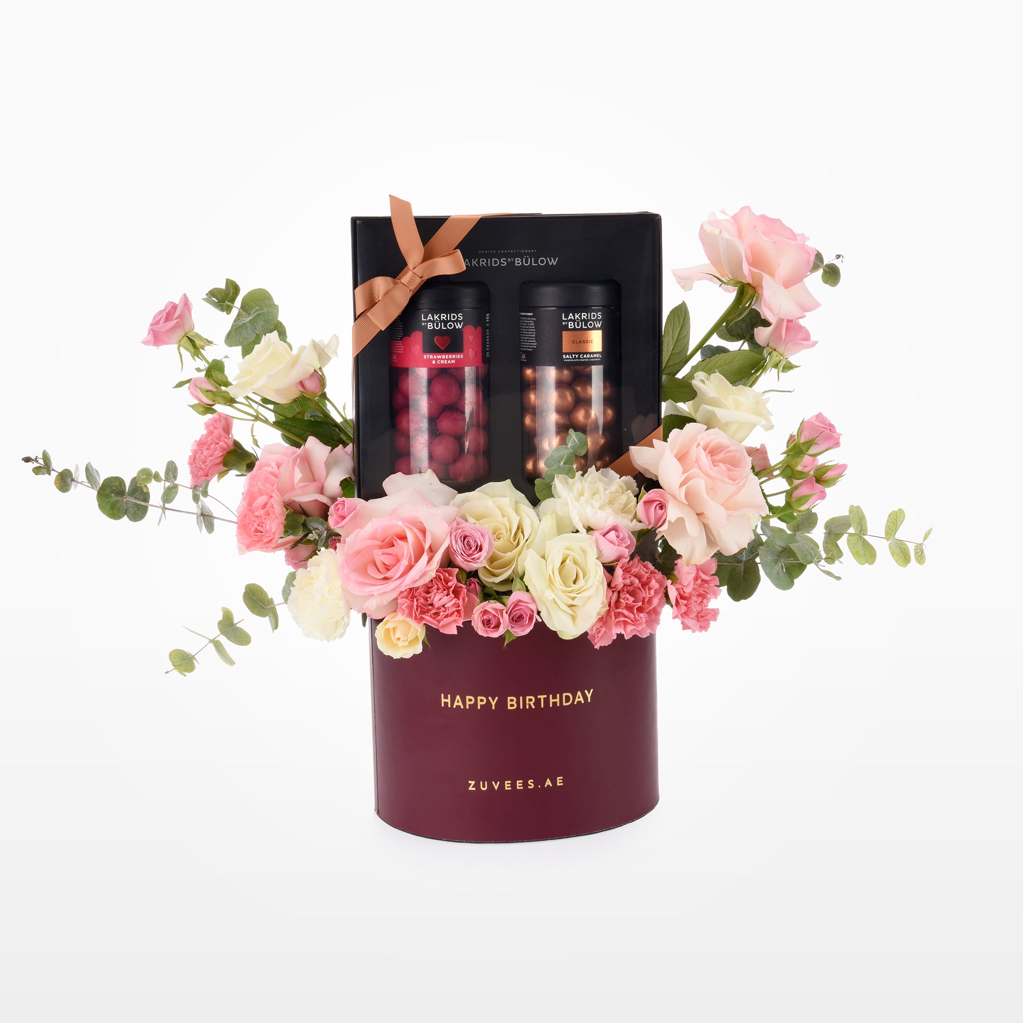 Maroon birthday gift box with pink/white roses and two chocolate tins.
