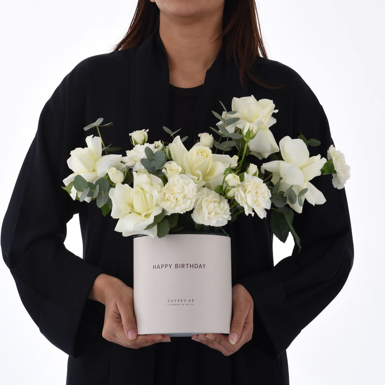 Elegant white roses and carnations in minimalist box, “Happy Birthday” text.