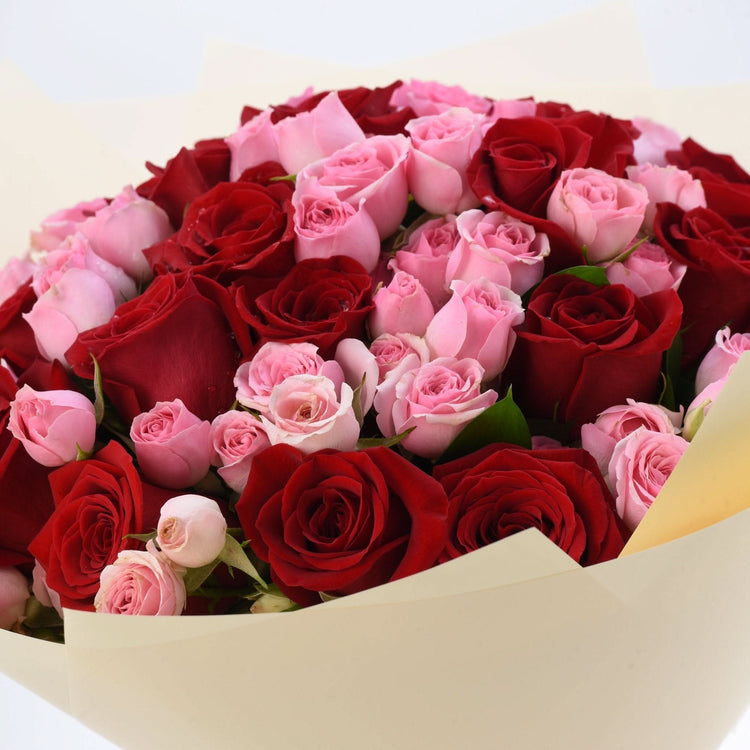 Freedom of Love 50 Rose Bouquet with Chocolate Cake - Zuvees.ae