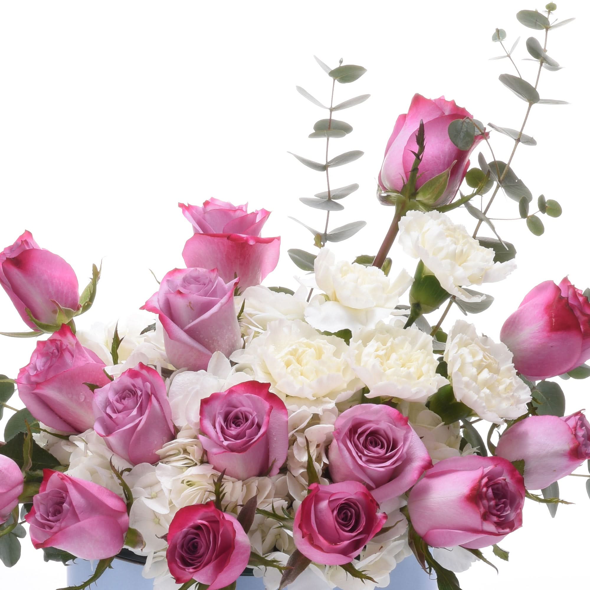 Pink and white roses with eucalyptus, fresh and elegant floral arrangement.