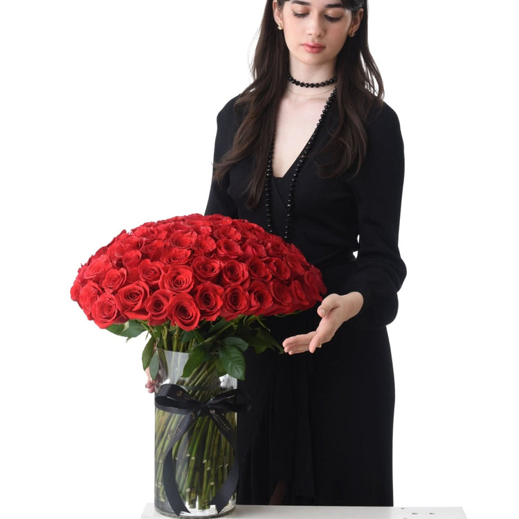 100 Red Roses In Glass Vase - Zuvees.ae