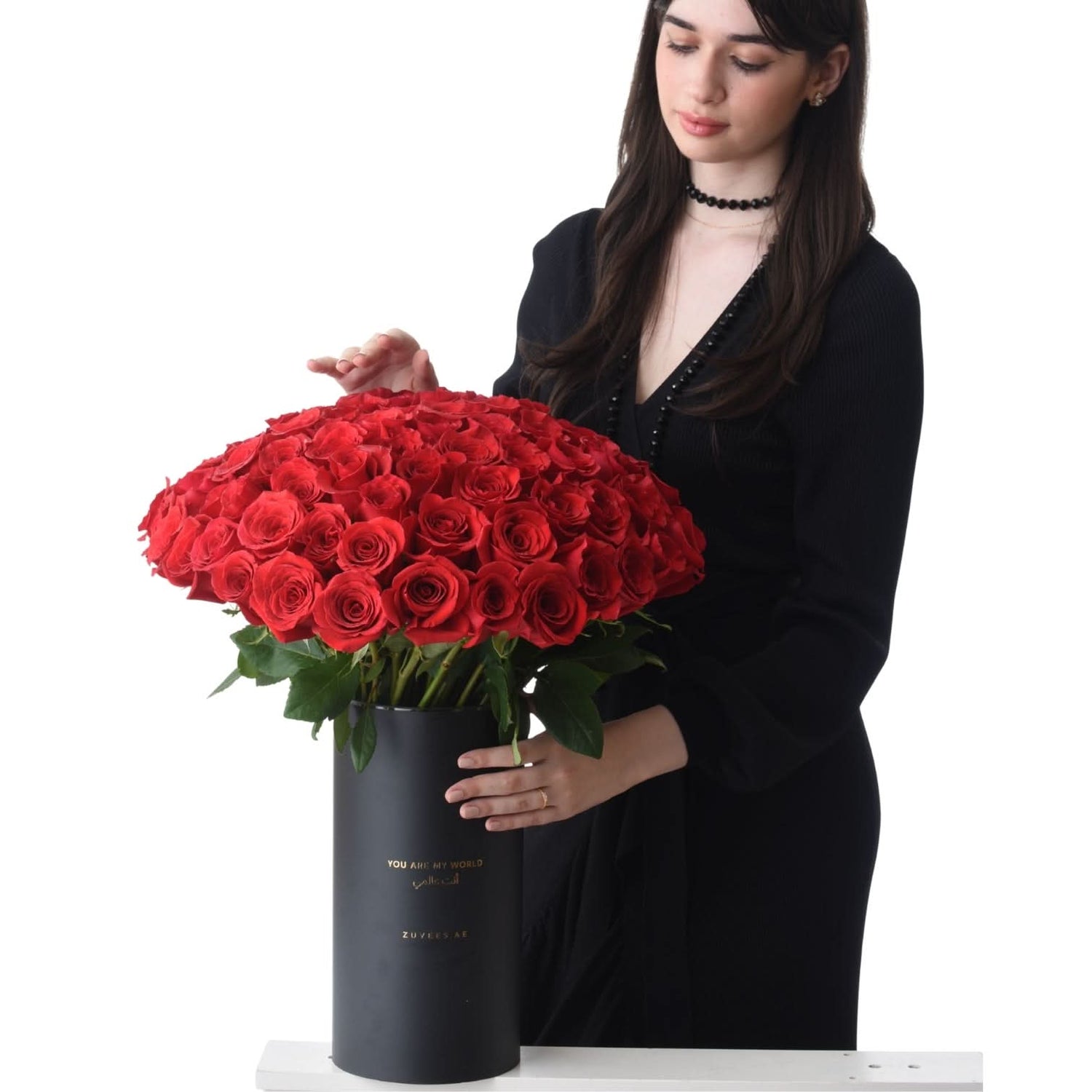 100 Red Roses In Black Vase - Zuvees.ae