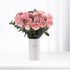 Soft pink roses in minimalist white vase with bilingual apology message.