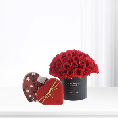 50 Roses in Black Love Vase with Body Shop &amp; Bateel Dates - Zuvees.ae