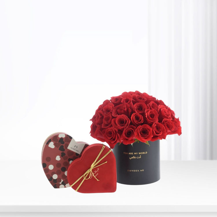 50 Roses in Black Love Vase with Body Shop &amp; Bateel Dates - Zuvees.ae
