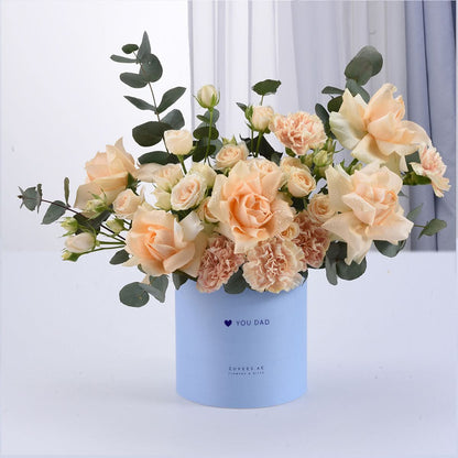 Soft peach roses and carnations in light blue “YOU DAD” gift box.