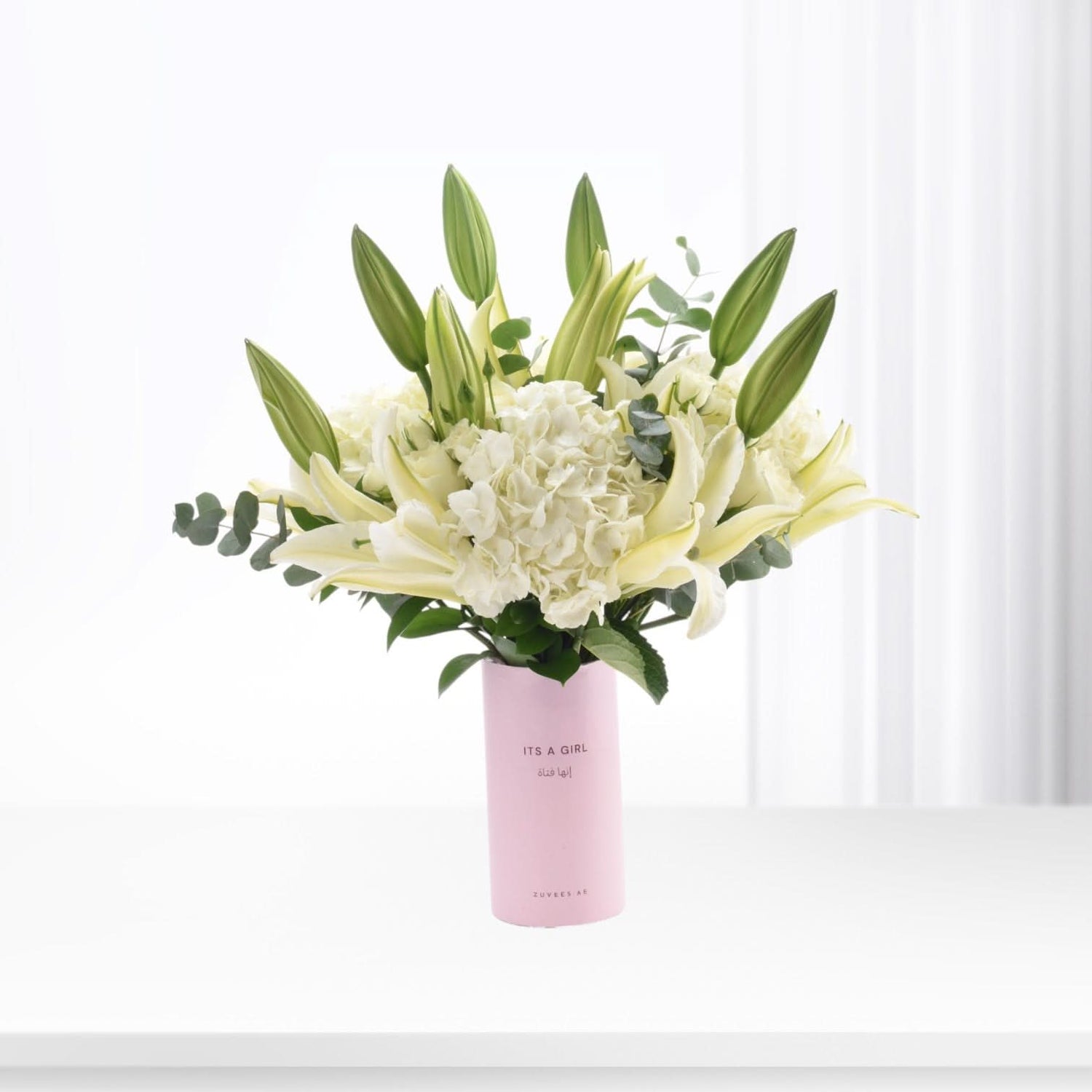 Soft white lilies and hydrangeas in pink "It&