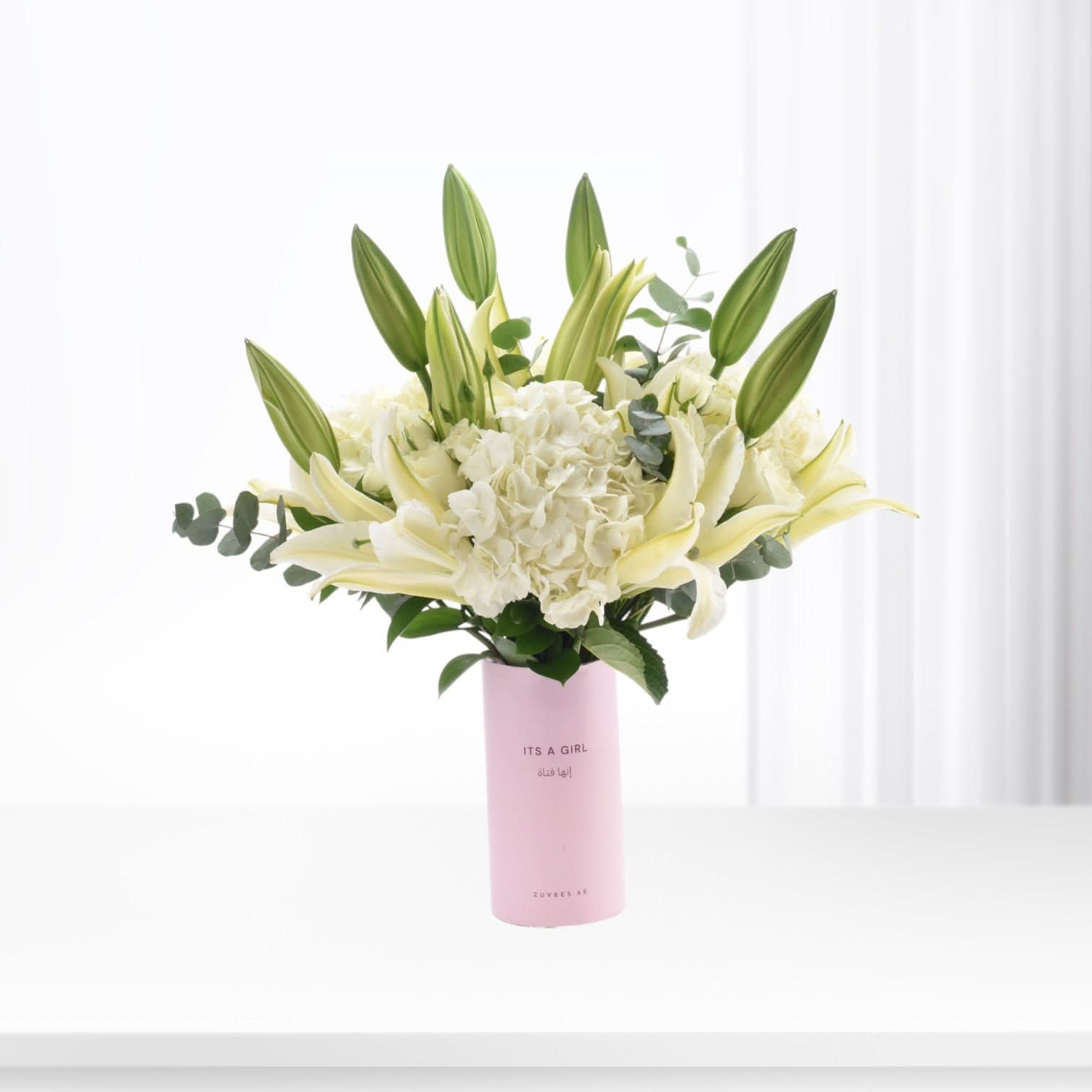 Soft white lilies and hydrangeas in pink "It&