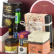 Luxury gourmet gift hamper with truffle chips, coffee, honey, and festive dates.