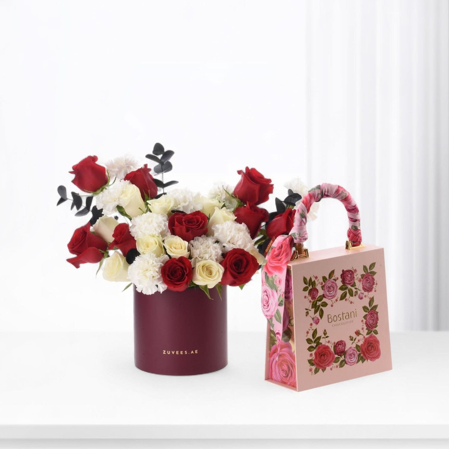 Oasis of Roses in Signature Box with Chocolate Combo