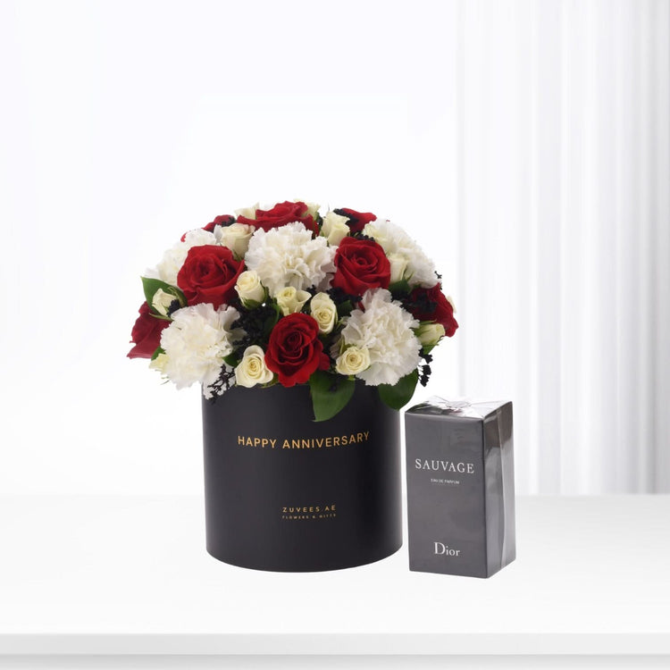 Elegant black hat box with red/white roses and Dior Sauvage perfume.