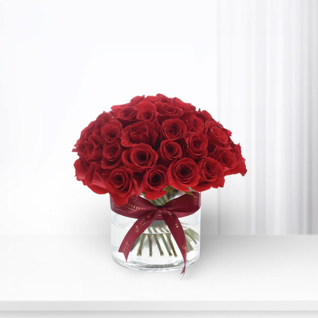 50 Red Roses in Vase - Zuvees.ae