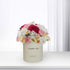 Cream box holds vibrant pink, white, and peach roses and carnations, "Thank You" printed.