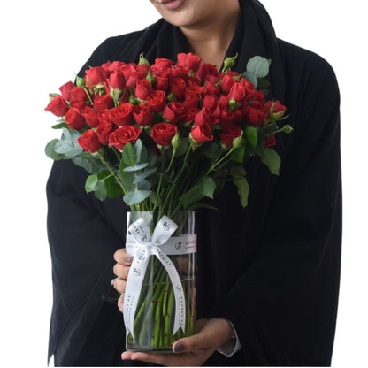 The Majestic 25 Red Spray Roses Vase Arrangement - Zuvees.ae