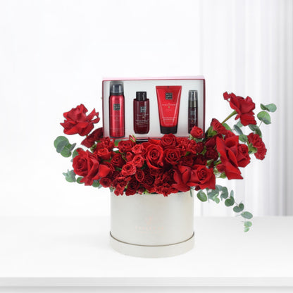 Luxurious red rose bouquet with Ayurveda spa gift set in elegant white box.