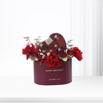Rich burgundy box with red roses, heart chocolate, and "Happy Birthday" text.