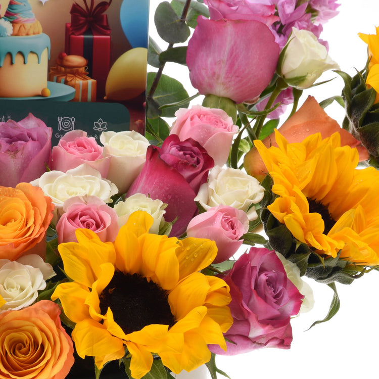 Vibrant sunflowers and roses in pink, white, and orange hues with dewdrops.