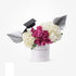White cylindrical vase with pink roses and hydrangeas, graduation cap, silver fan accents.
