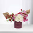 Luxury birthday bouquet: red, pink, white roses & hydrangeas in burgundy box with gold text.