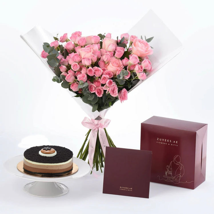 Pink roses bouquet with chocolate cake and branded gift box.