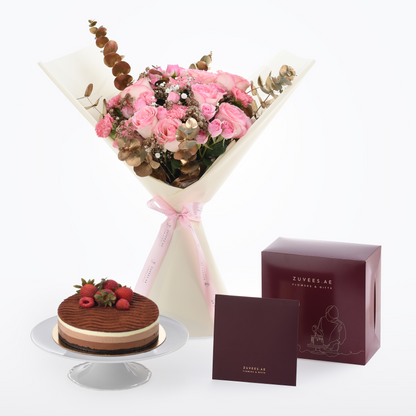 Pink roses bouquet with gold eucalyptus, chocolate cake, burgundy gift boxes, elegant white wrap, pink ribbon.