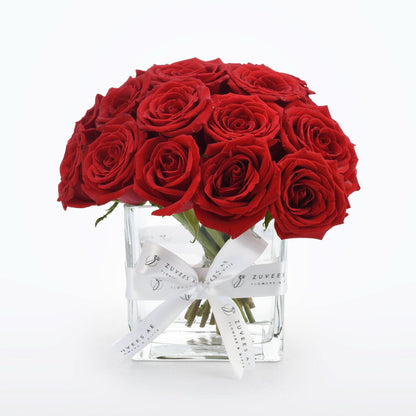 Red Elegance in Glass Vase - Zuvees.ae