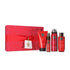 Vibrant red gift set with leaf patterns, featuring four matching Ayurveda skincare products.