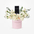 Elegant white roses and eucalyptus in pink "Congratulations" box with Dior Sauvage perfume.