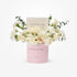 Elegant white roses, carnations, eucalyptus in pink "Congratulations" box by Zuvees.AE.