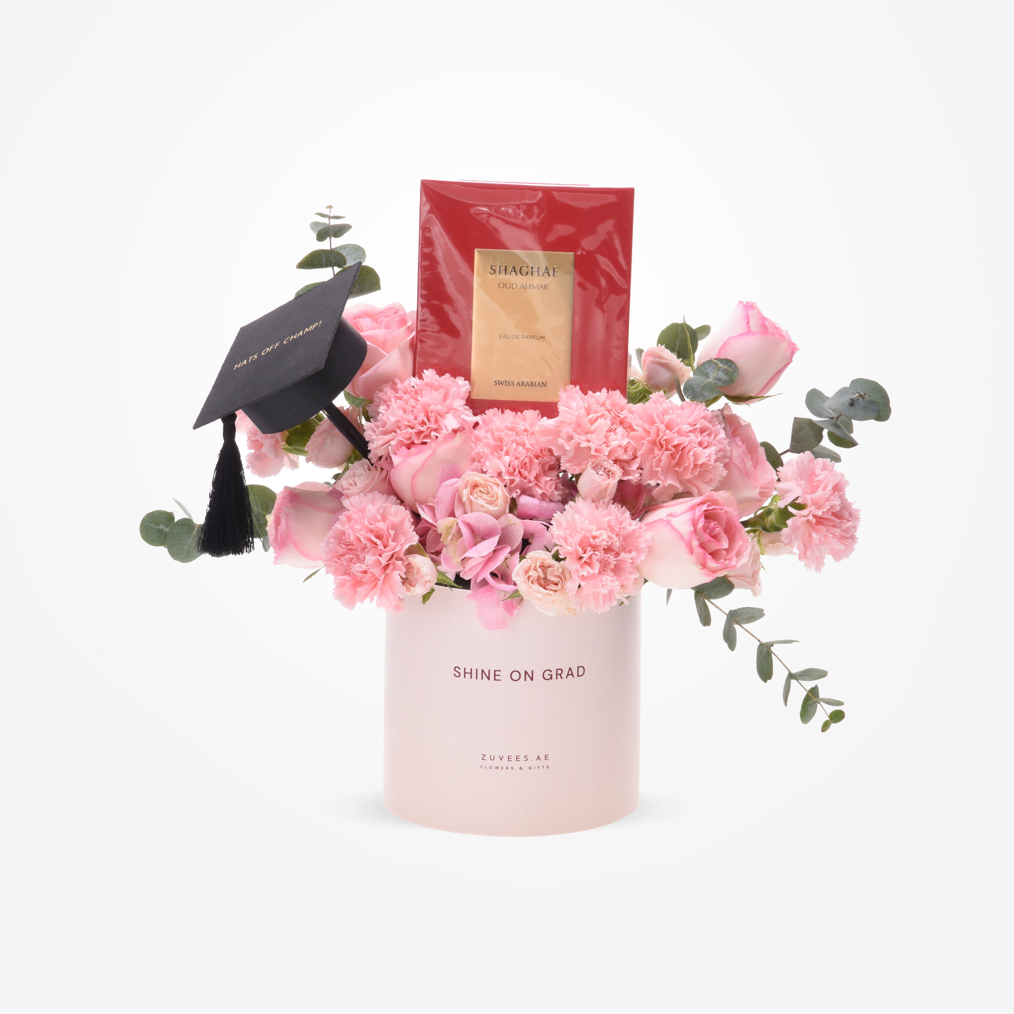 Pink floral graduation gift box with perfume and tiny cap.