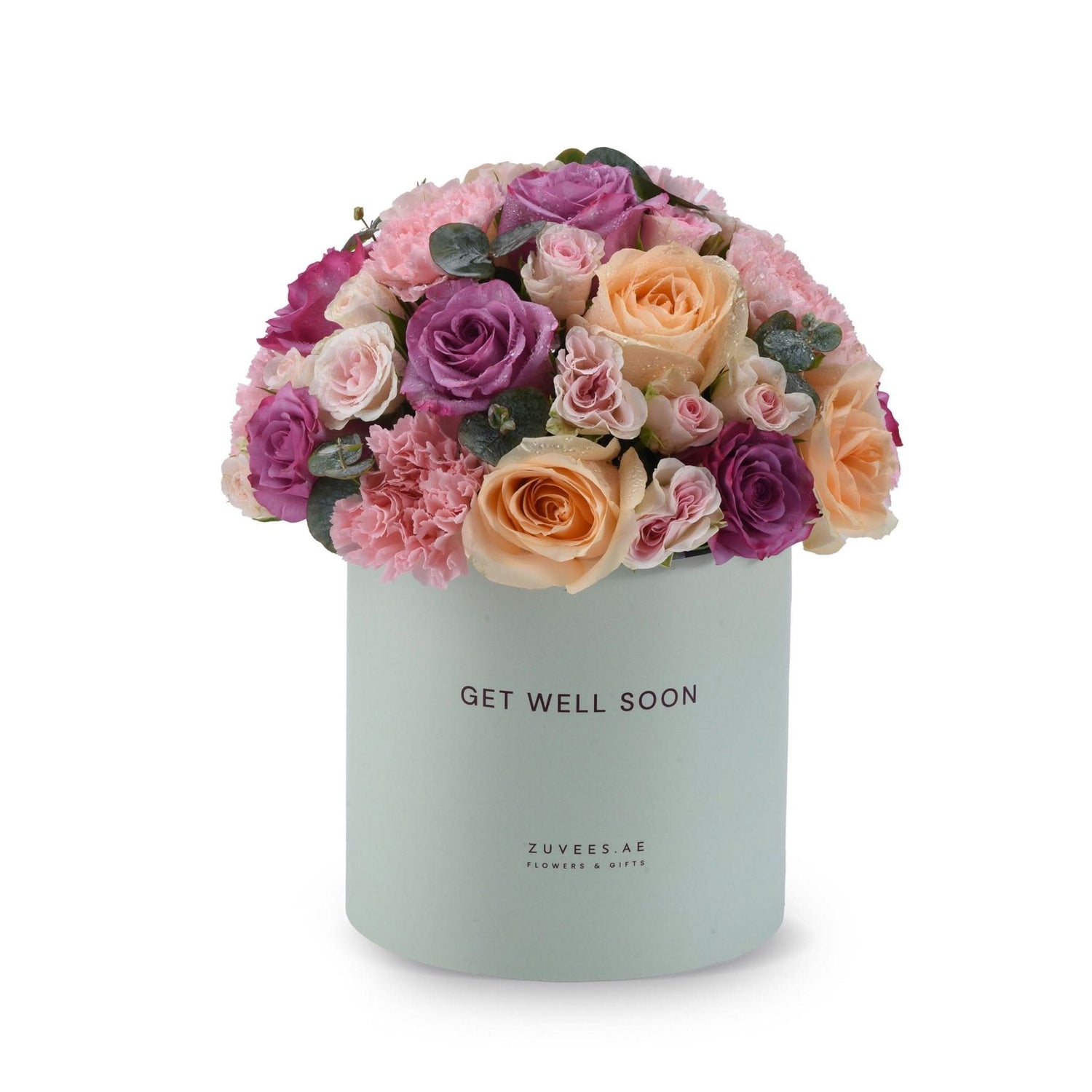 Pastel mint box holds vibrant pink, purple, and peach roses with "Get Well Soon" message.