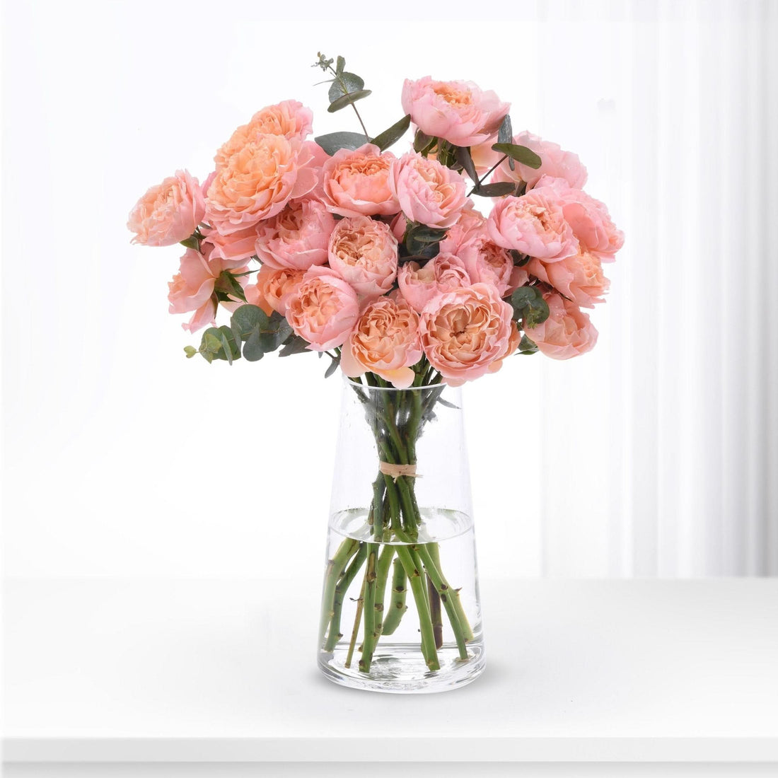 Blushing Grace in a Vase - Zuvees.ae