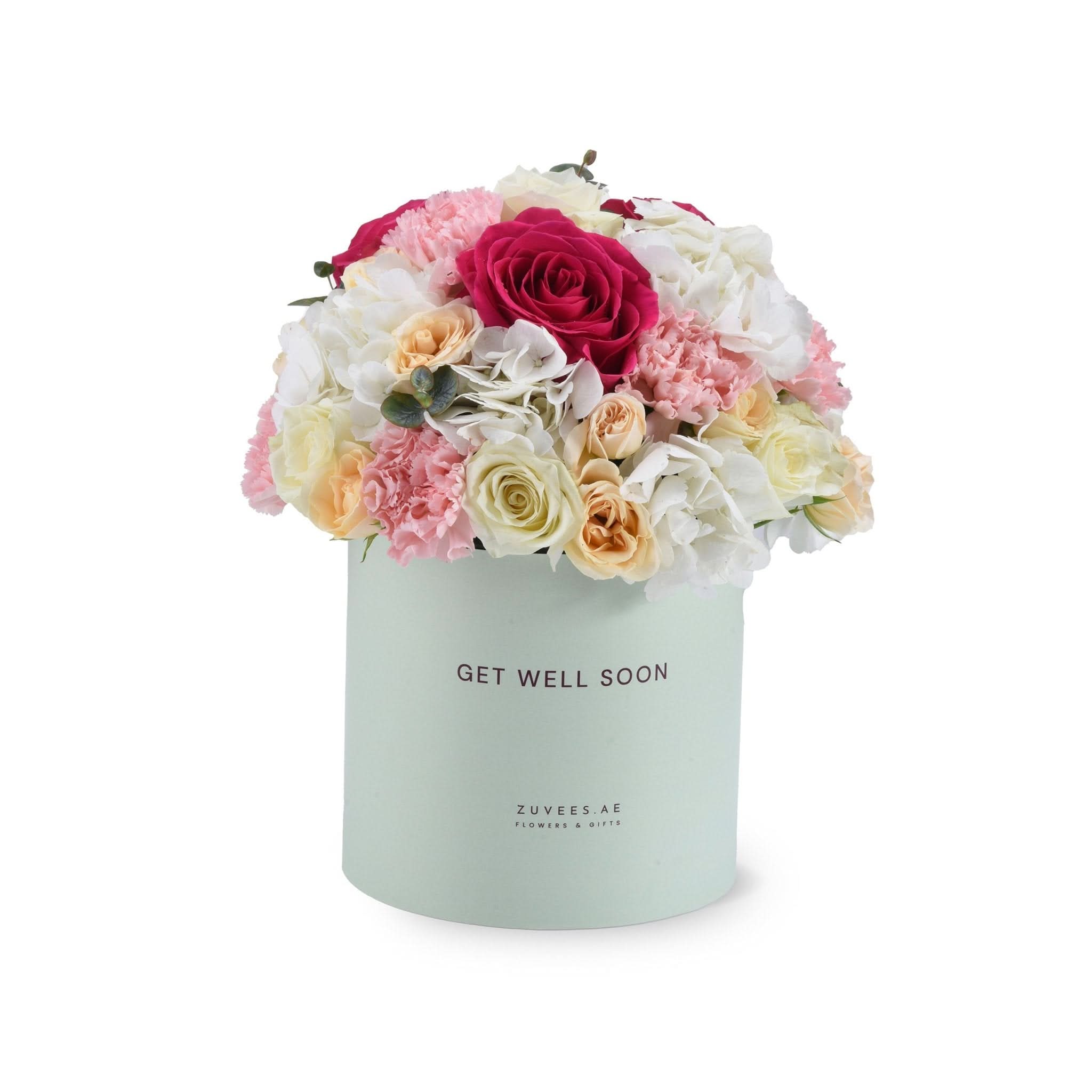 Pastel mint box holds vibrant pink, white, and peach blooms with "Get Well Soon" message.