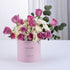 Pink rose bouquet in soft pink box reading "It&