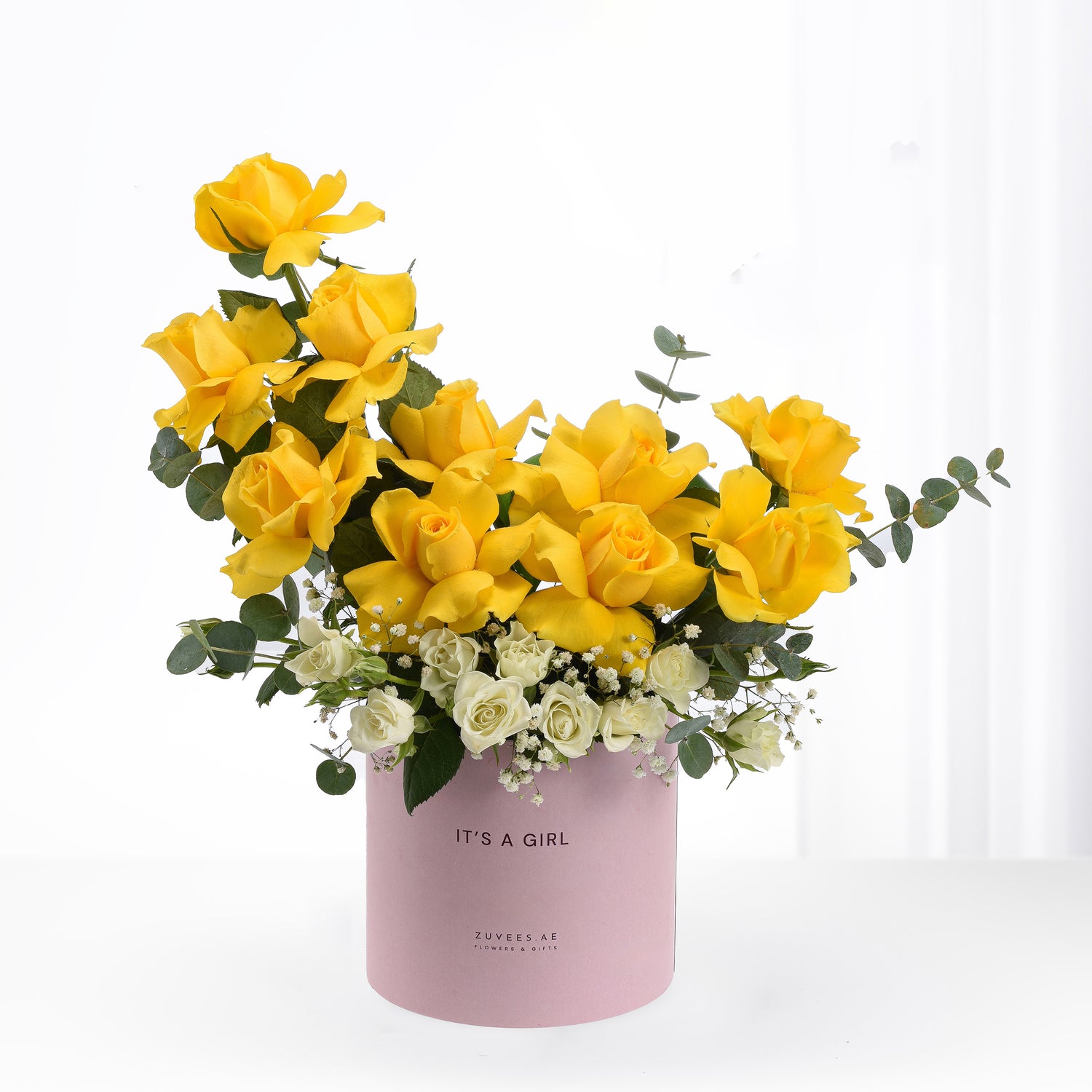 Vibrant yellow roses and white blooms in pink "It&
