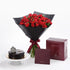 Luxurious red roses in black wrap paired with chocolate cake and branded gift box.