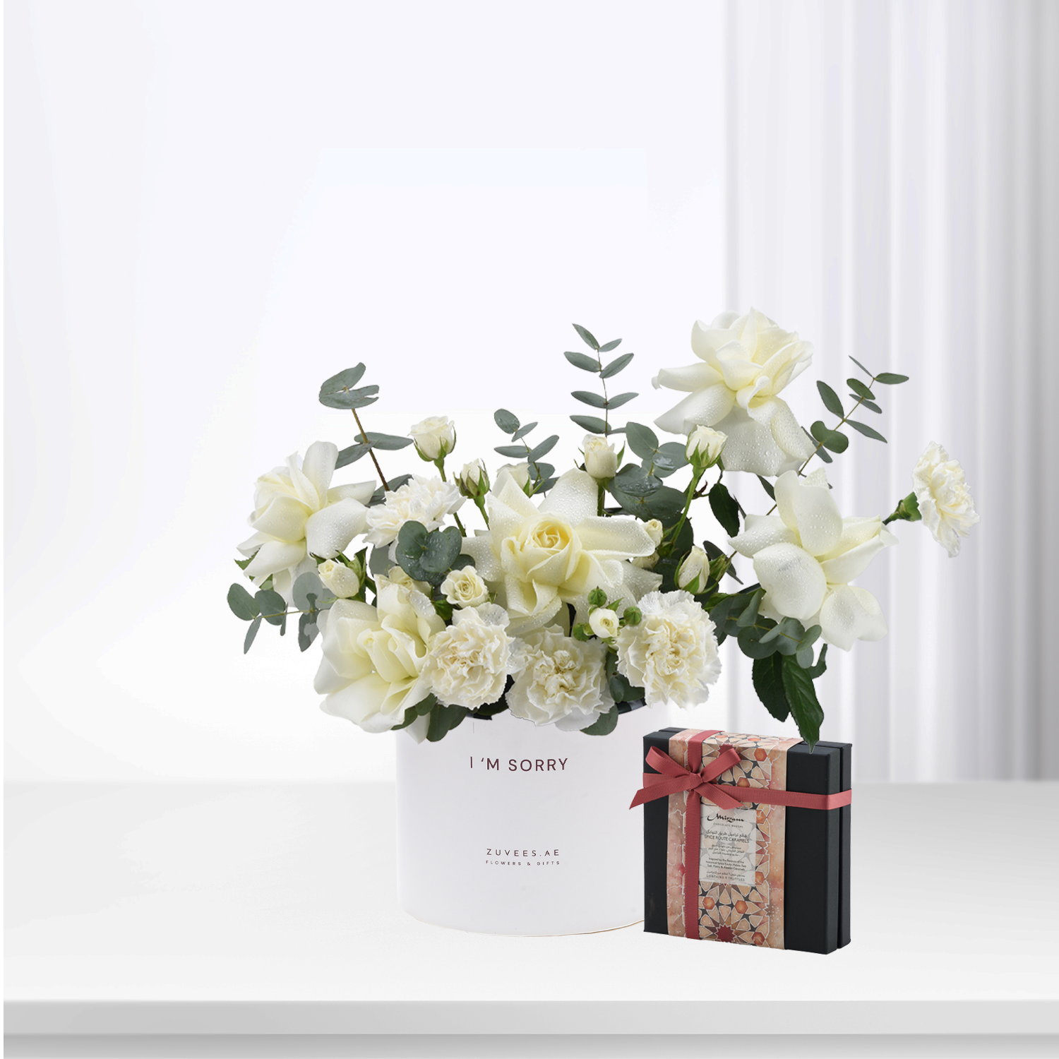 White roses and eucalyptus in "I&