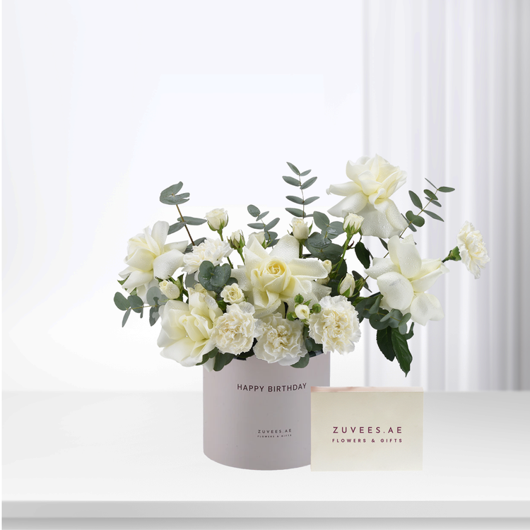 Elegant white roses and eucalyptus in blush box, "Happy Birthday" gift.