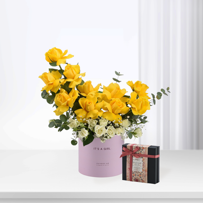 Vibrant yellow roses and white blooms in pink "It&