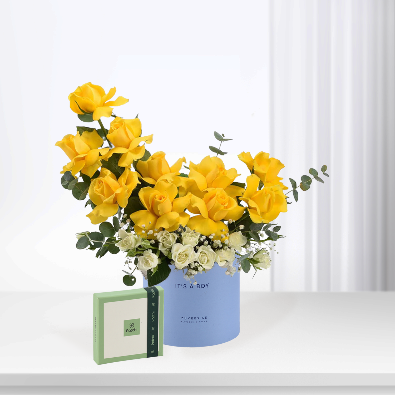 Vibrant yellow roses in blue "It&