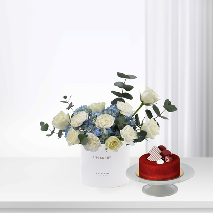 White roses and blue hydrangeas in "I&