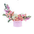 Soft pink roses, hydrangeas, and eucalyptus in a lavender box reading "She&