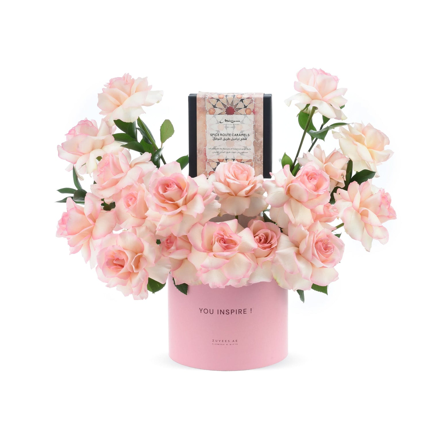 Soft pink roses in a matching vase with "YOU INSPIRE!" and caramel gift box.