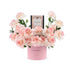 Soft pink roses in a matching vase with "YOU INSPIRE!" and caramel gift box.
